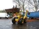 2002 New Holland  LB 115 B - 4 HP / hammer Line / Power Shift / climate Construction machine Combined Dredger Loader photo 8