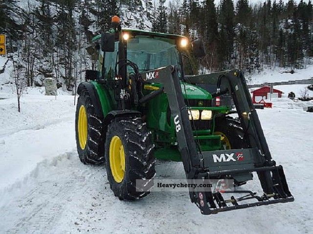 2012 John Deere  -5720 - Agricultural vehicle Tractor photo