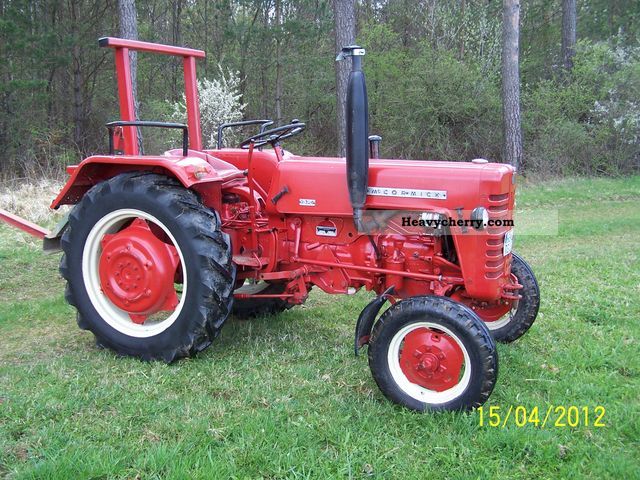 1962 McCormick  324, with cutter bar, Agricultural vehicle Tractor photo