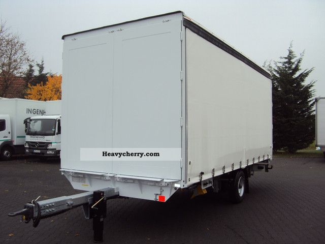 2012 Krukenmeier  Single Axle ELPS 5 NEW Tilt / through loader Trailer Stake body and tarpaulin photo