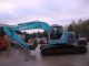 Kobelco  235 SRLC with new chains 2000 Caterpillar digger photo