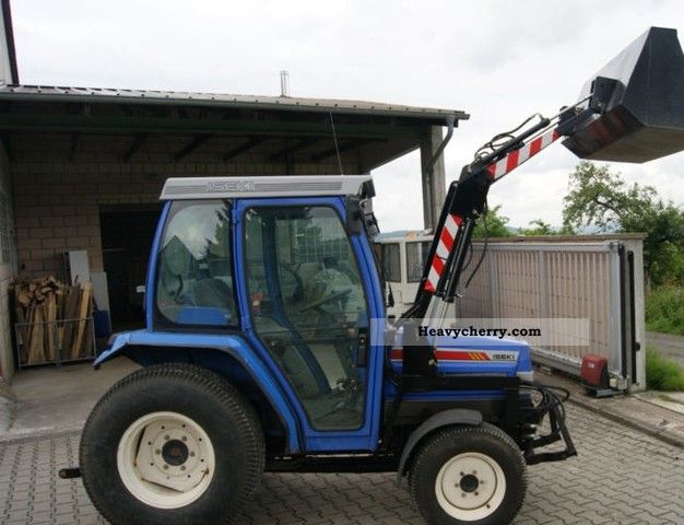 2003 Iseki  5040 with front loader 4 forward gears, 4 reverse Agricultural vehicle Tractor photo