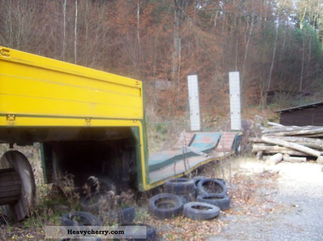 1990 Dinkel  Low bed trailer for forest machines Semi-trailer Low loader photo